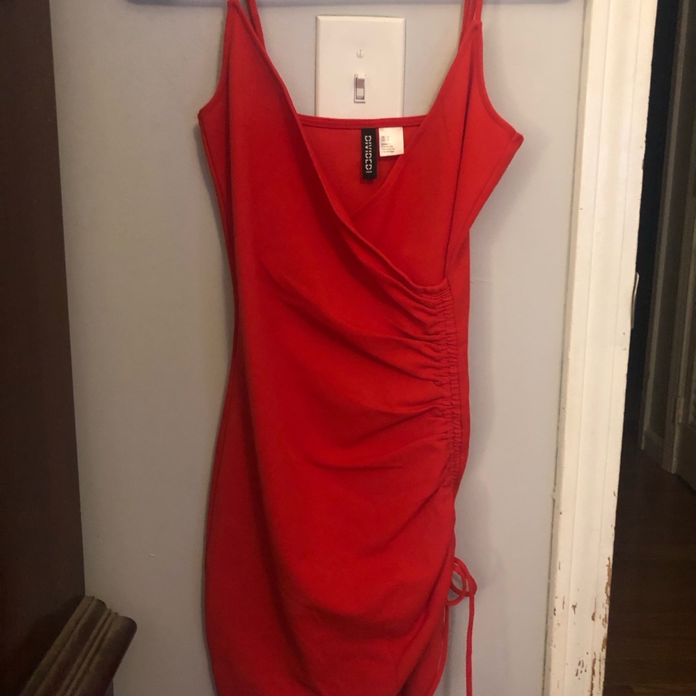 Ruched red a-symmetrical mini dress